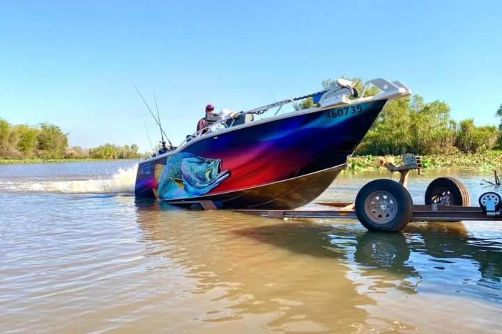 a small boat in a body of water