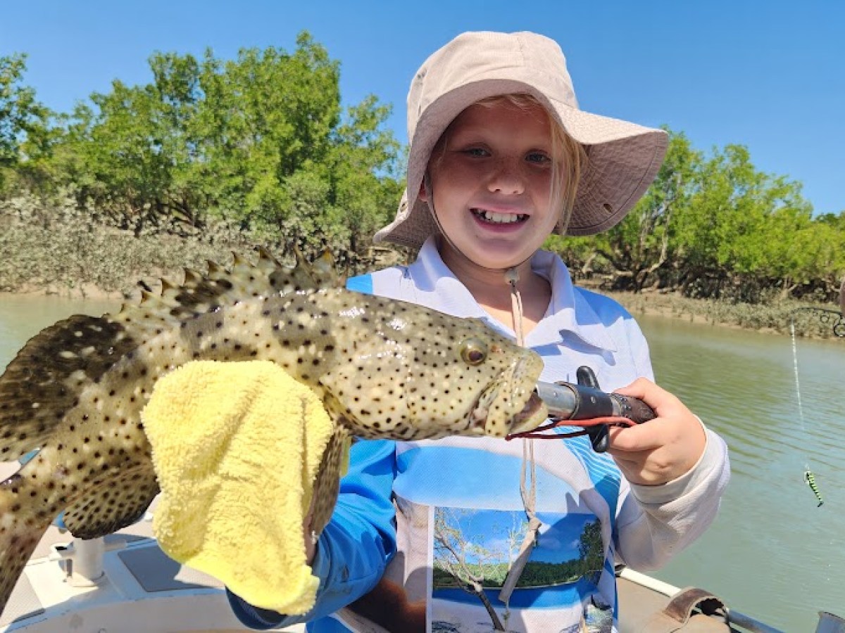 a person holding an animal