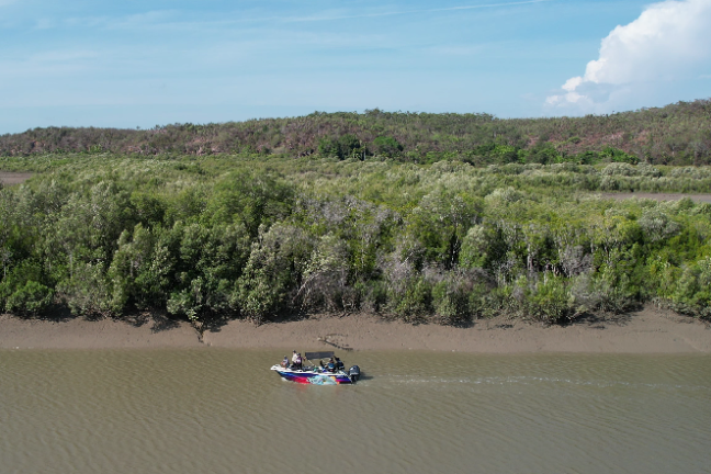 a small boat in a body of water