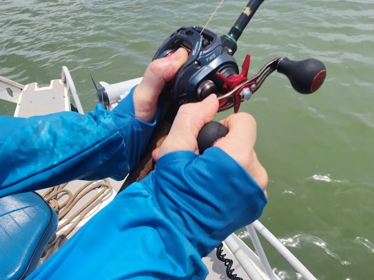 a person in a boat on a body of water